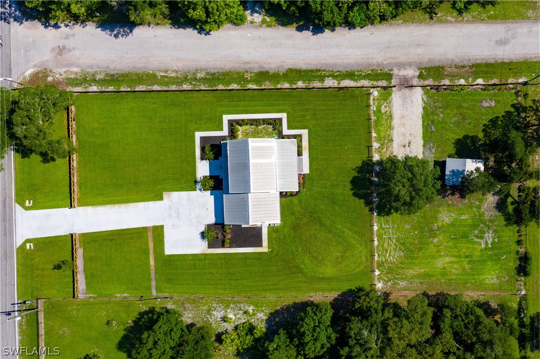 21510 North River Road Alva, FL 33920 - Photo 8 of 35 an aerial view of a residential houses with outdoor space and a lake view
