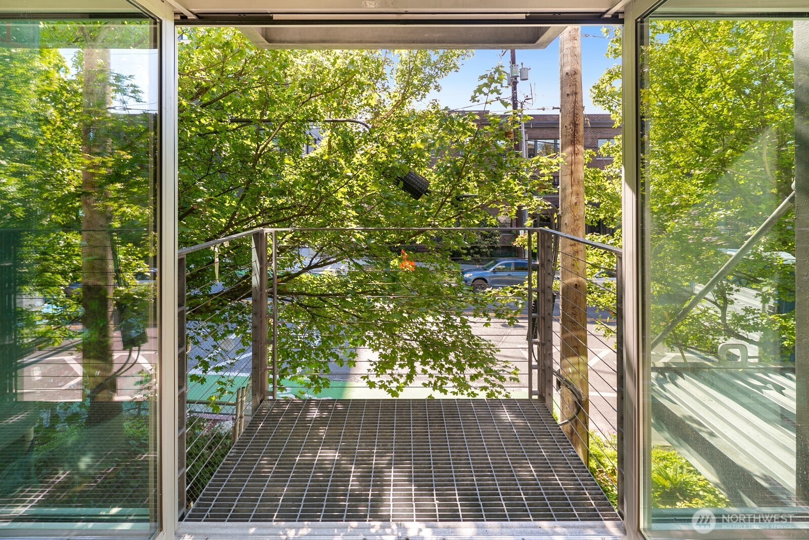 1310 East Union Street, Unit 202 Seattle, WA 98122 - Photo 23 of 31 a view of a door and an outdoor space