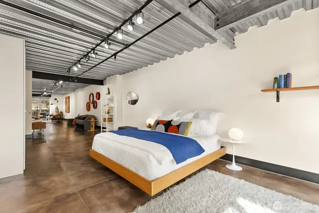 a bed room with a bed and a walk in closet