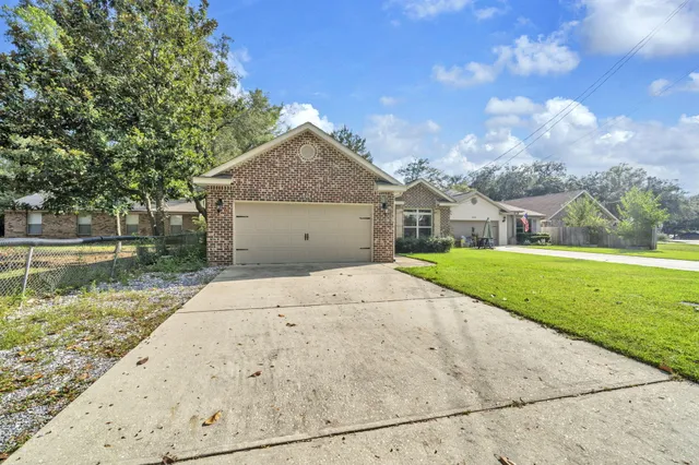 $450,000 | 817 Spencer Place, Niceville, FL 32578