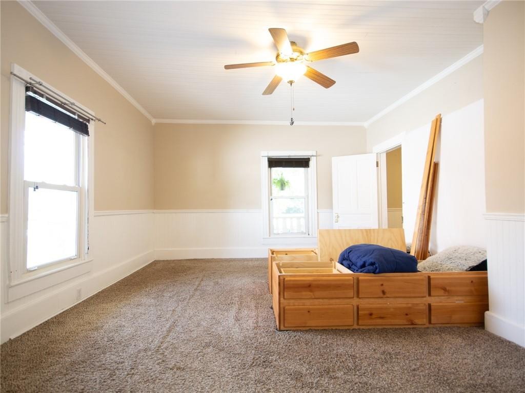 8076 Broad Street Rural Hall, NC 27045 - Photo 11 of 36 a living room with furniture and a window