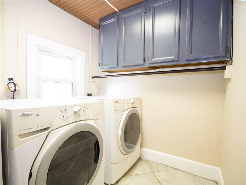 8076 Broad Street Rural Hall, NC 27045 - Photo 35 of 36 a view of a kitchen with washer and dryer