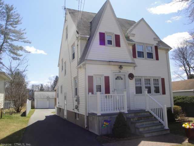 28 Dudley Road Wethersfield, CT 06109 - Photo 1 of 1 a front view of a house with a yard