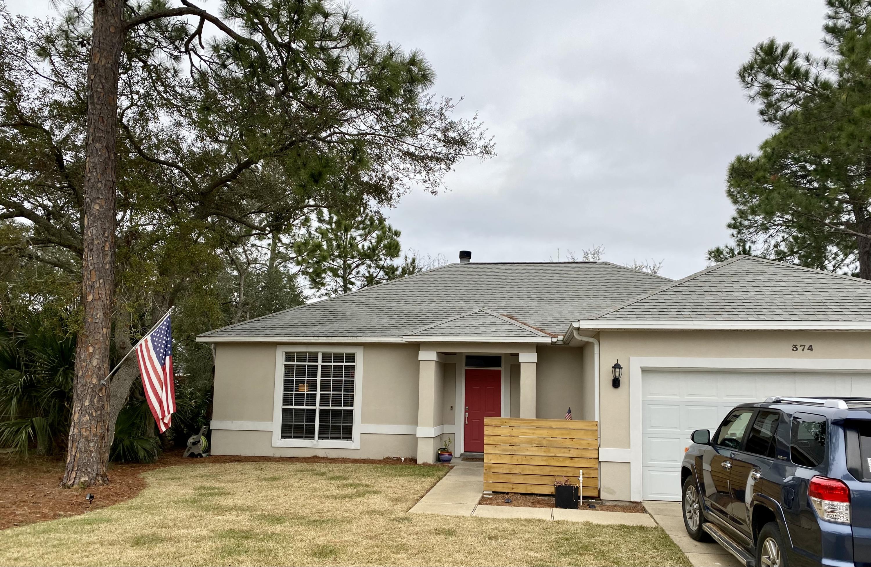 374 Sonora Road Destin, FL 32541 - Photo 1 of 1 a view of a car park in front of house