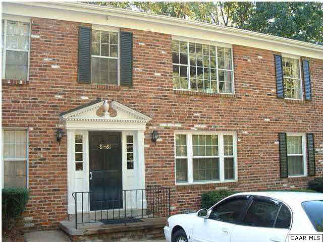 2517 Hydraulic Road, Unit 85 Charlottesville, VA 22901 - Photo 1 of 6 a view of a brick house with many windows