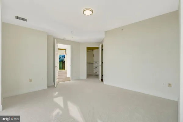 a bathroom with a shower and a sink