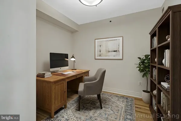 a view of a hallway with washer and dryer