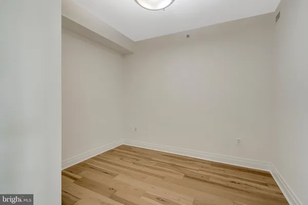 a view of a hallway with washer and dryer