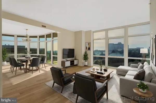 a view of an empty room with a large window