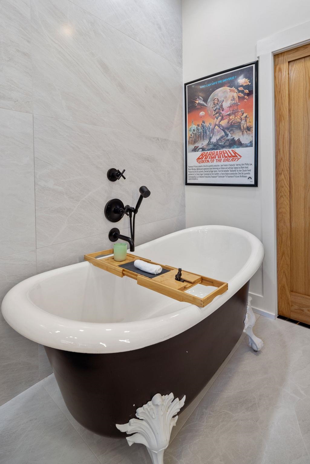 277 York Street, Unit 501 Jersey City, NJ 07302 - Photo 12 of 18 a bathroom with a sink and bathtub