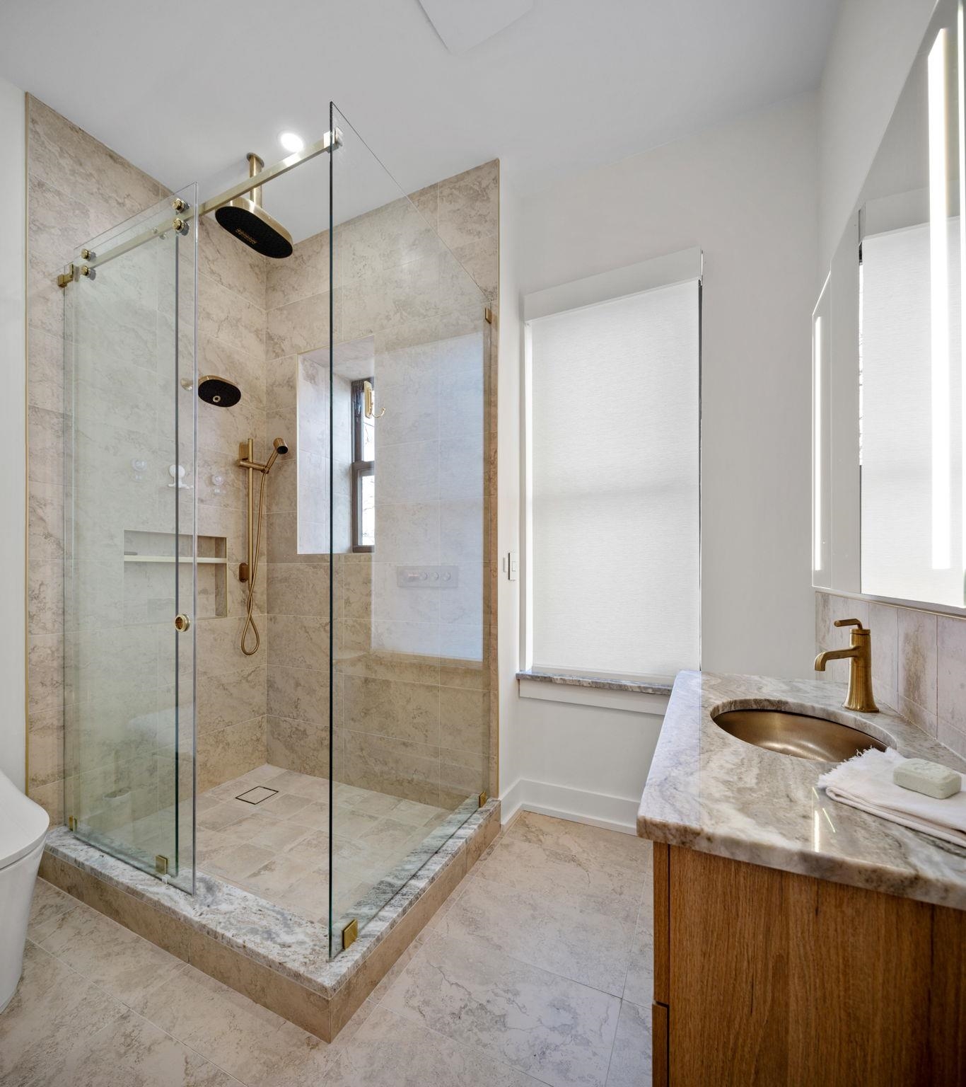 277 York Street, Unit 501 Jersey City, NJ 07302 - Photo 15 of 18 a bathroom with a granite countertop sink mirror and shower