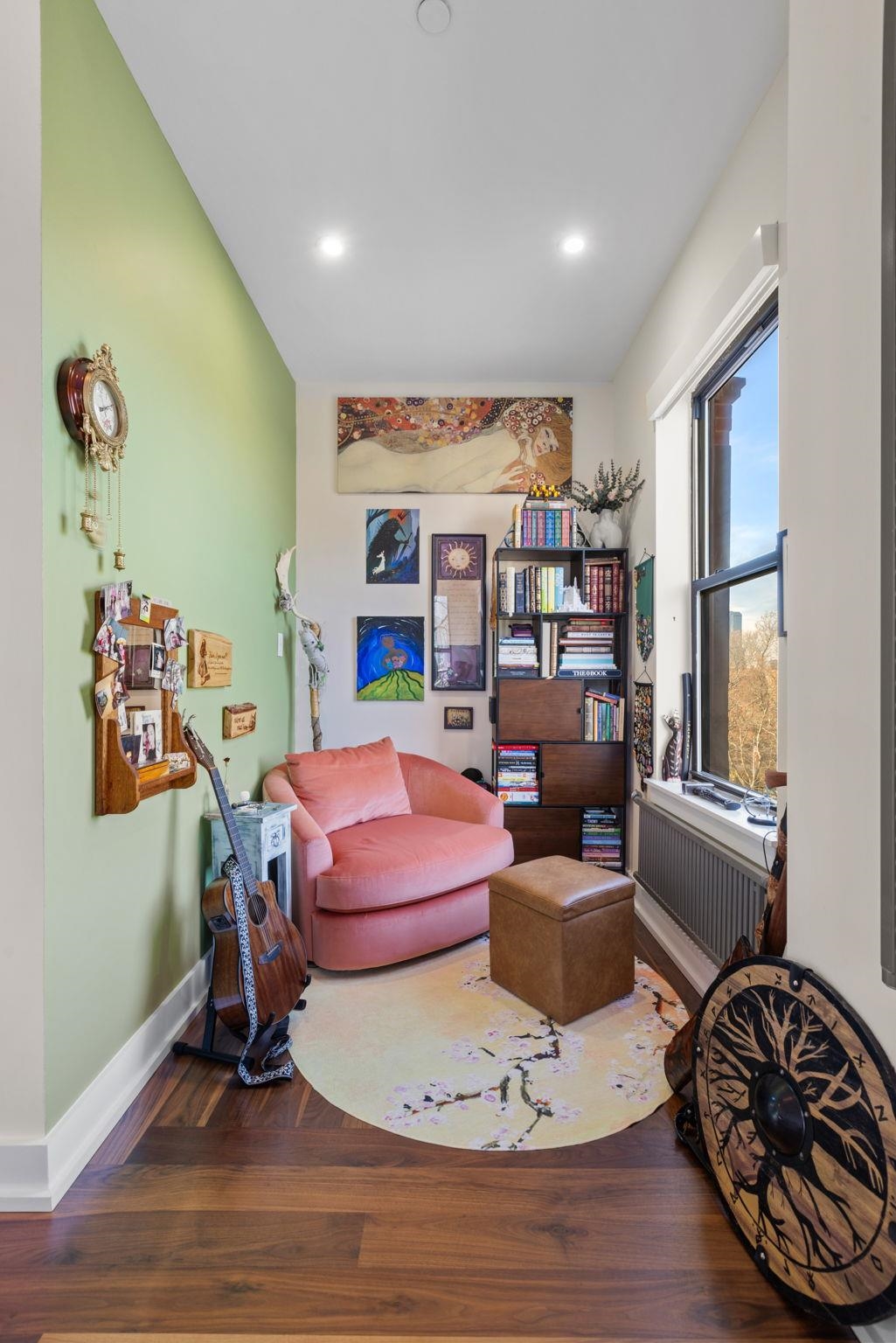 277 York Street, Unit 501 Jersey City, NJ 07302 - Photo 10 of 18 a living room with furniture and a wooden floor