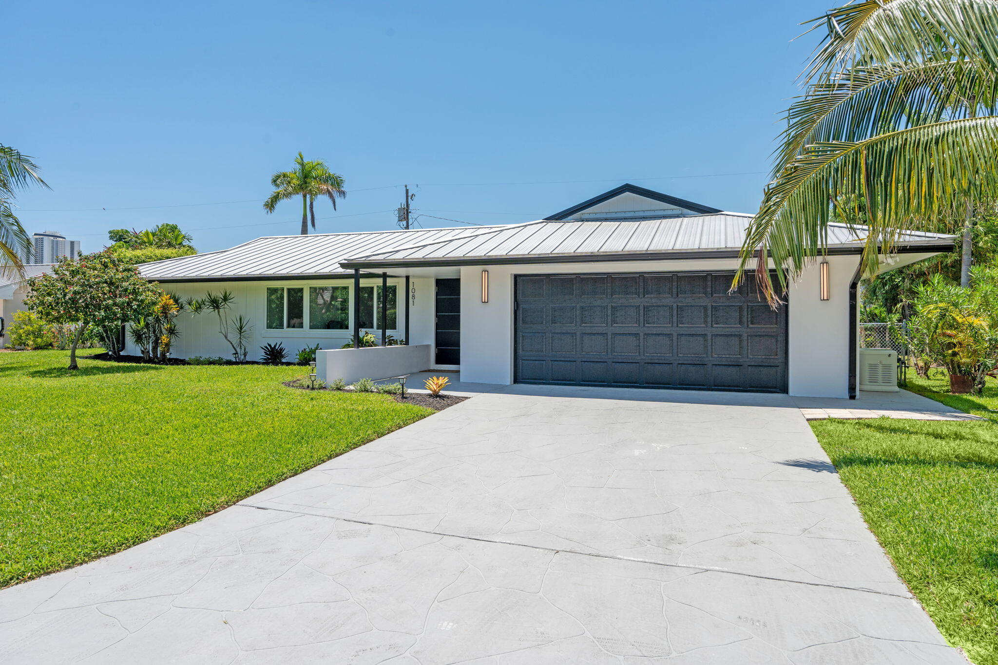 1081 Bimini Lane Singer Island, FL 33404 - Photo 2 of 39 front