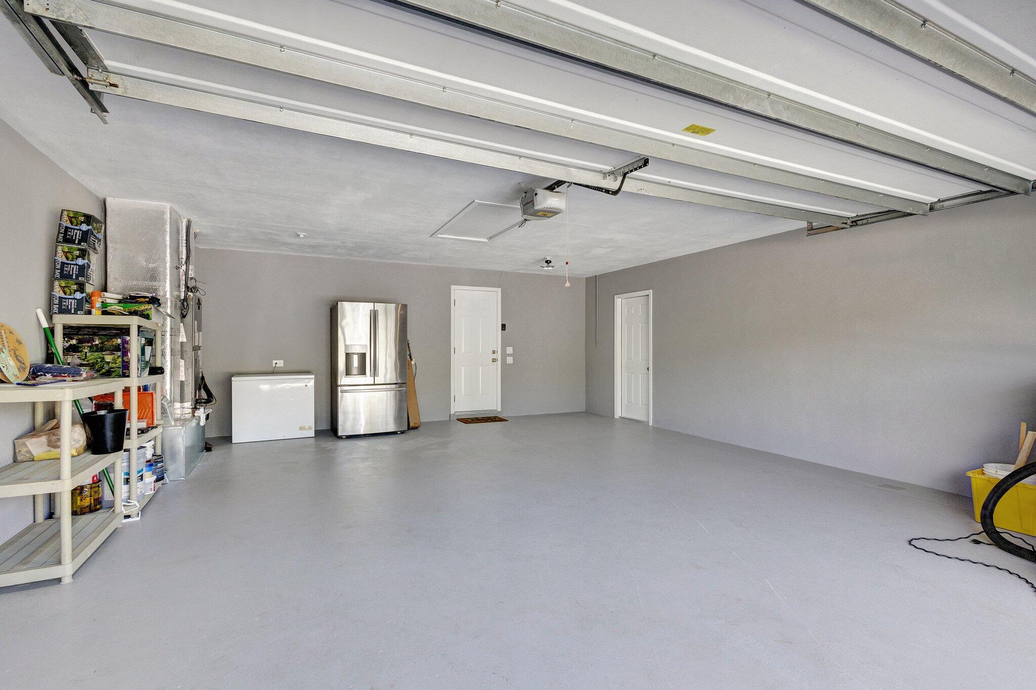 1081 Bimini Lane Singer Island, FL 33404 - Photo 31 of 39 garage w Wifi garage door opener