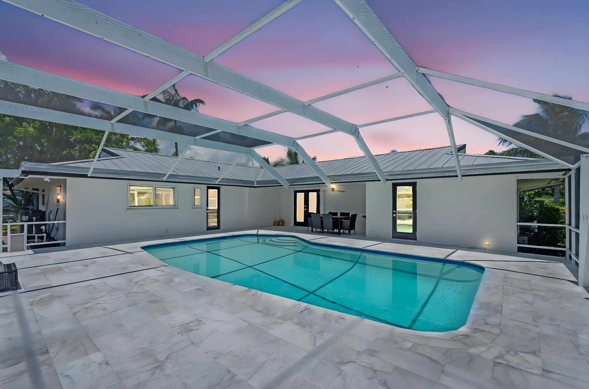 1081 Bimini Lane Singer Island, FL 33404 - Photo 39 of 39 Travertine Pool Deck