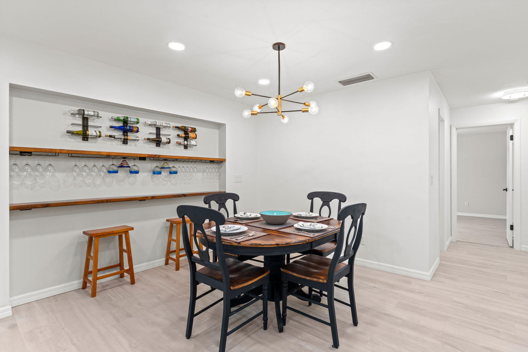 1081 Bimini Lane Singer Island, FL 33404 - Photo 8 of 39 dining room w luxury wine wall