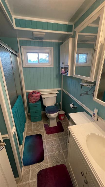 311 Kings Road Apollo, PA 15613 - Photo 9 of 11 a bathroom with a toilet sink and mirror