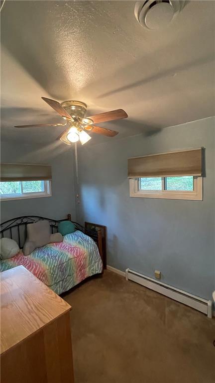 311 Kings Road Apollo, PA 15613 - Photo 10 of 11 a bedroom with a bed and a chandelier