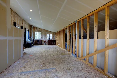 a view of a hallway with staircase