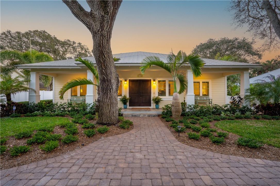 548 Conn Way Vero Beach, FL 32963 - Photo 1 of 34 a front view of a house with garden