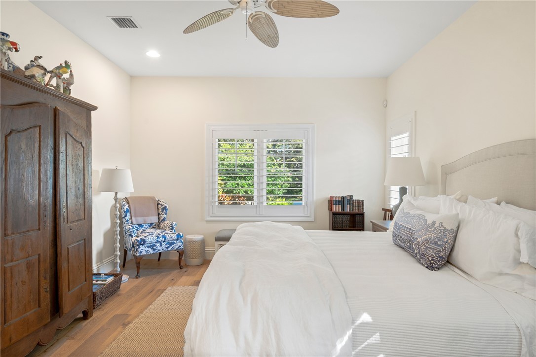 548 Conn Way Vero Beach, FL 32963 - Photo 24 of 34 a bedroom with a bed and a window