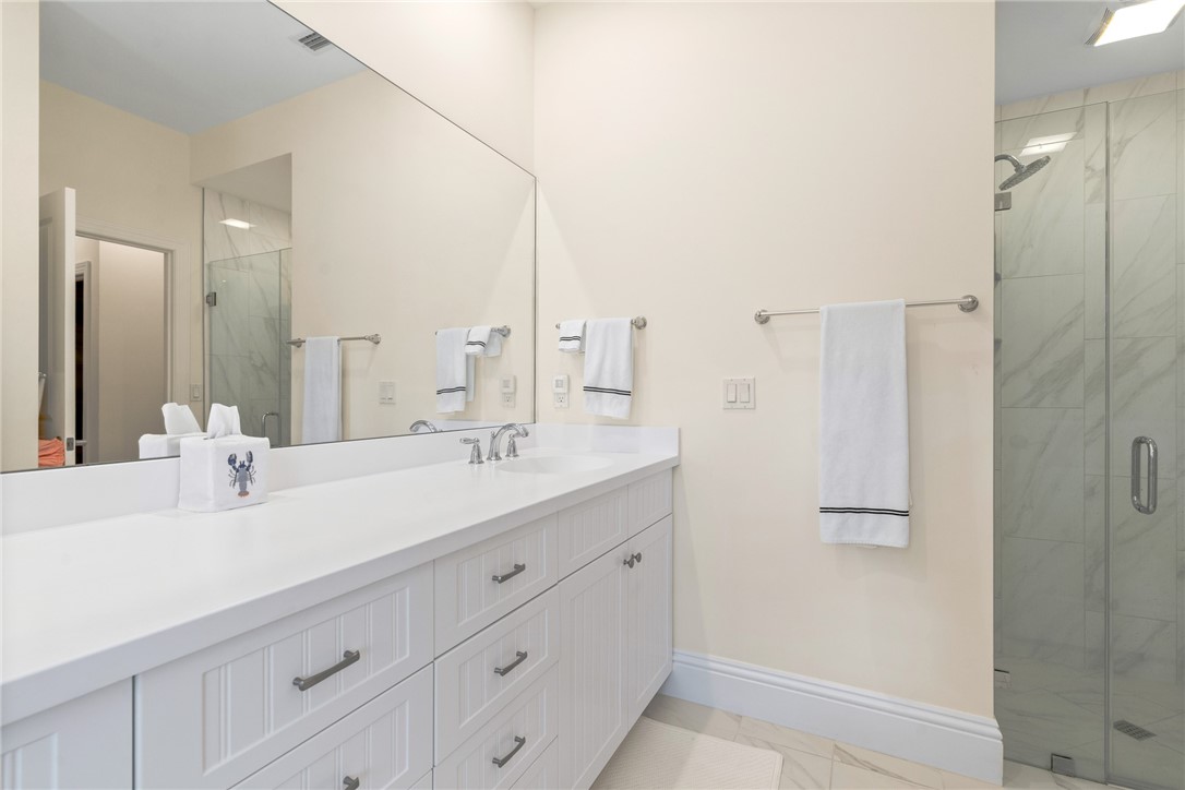 548 Conn Way Vero Beach, FL 32963 - Photo 26 of 34 a bathroom with a double vanity sink mirror and