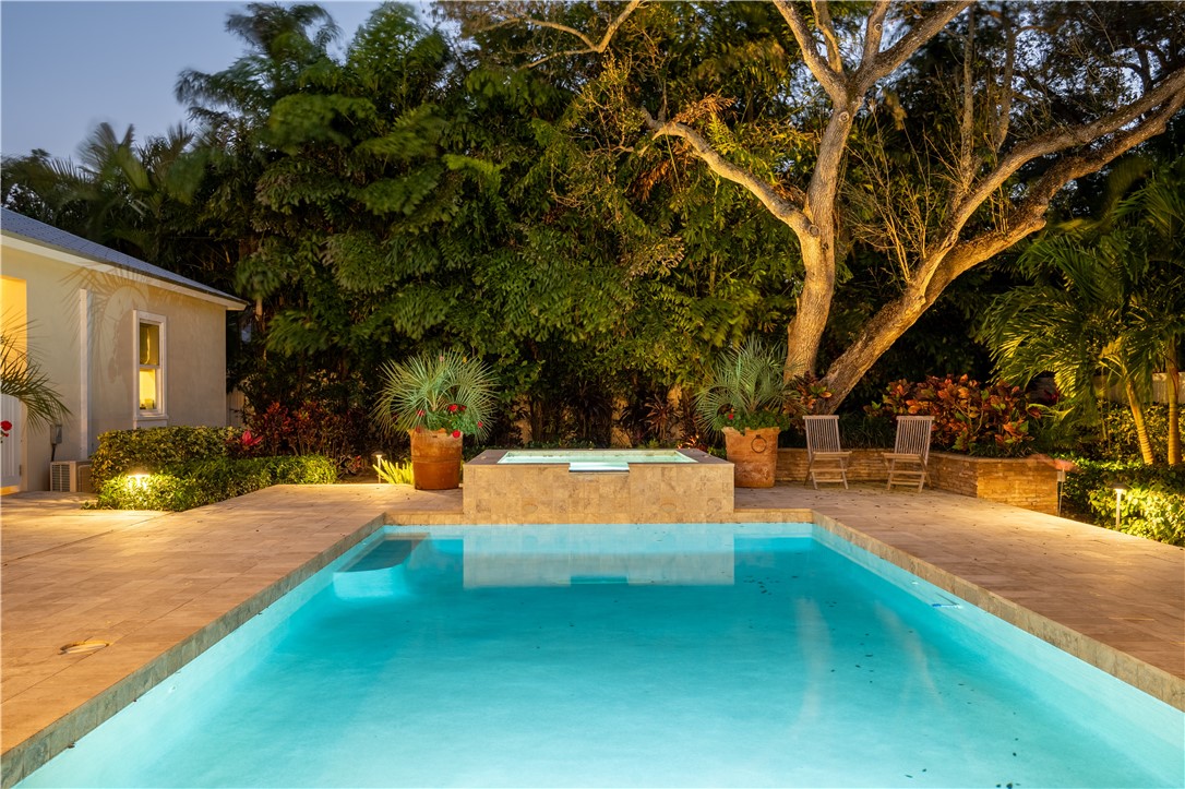 548 Conn Way Vero Beach, FL 32963 - Photo 3 of 34 a view of a swimming pool with an outdoor seating