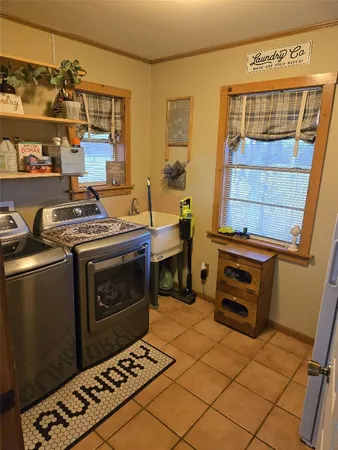a kitchen with a stove and a cabinet