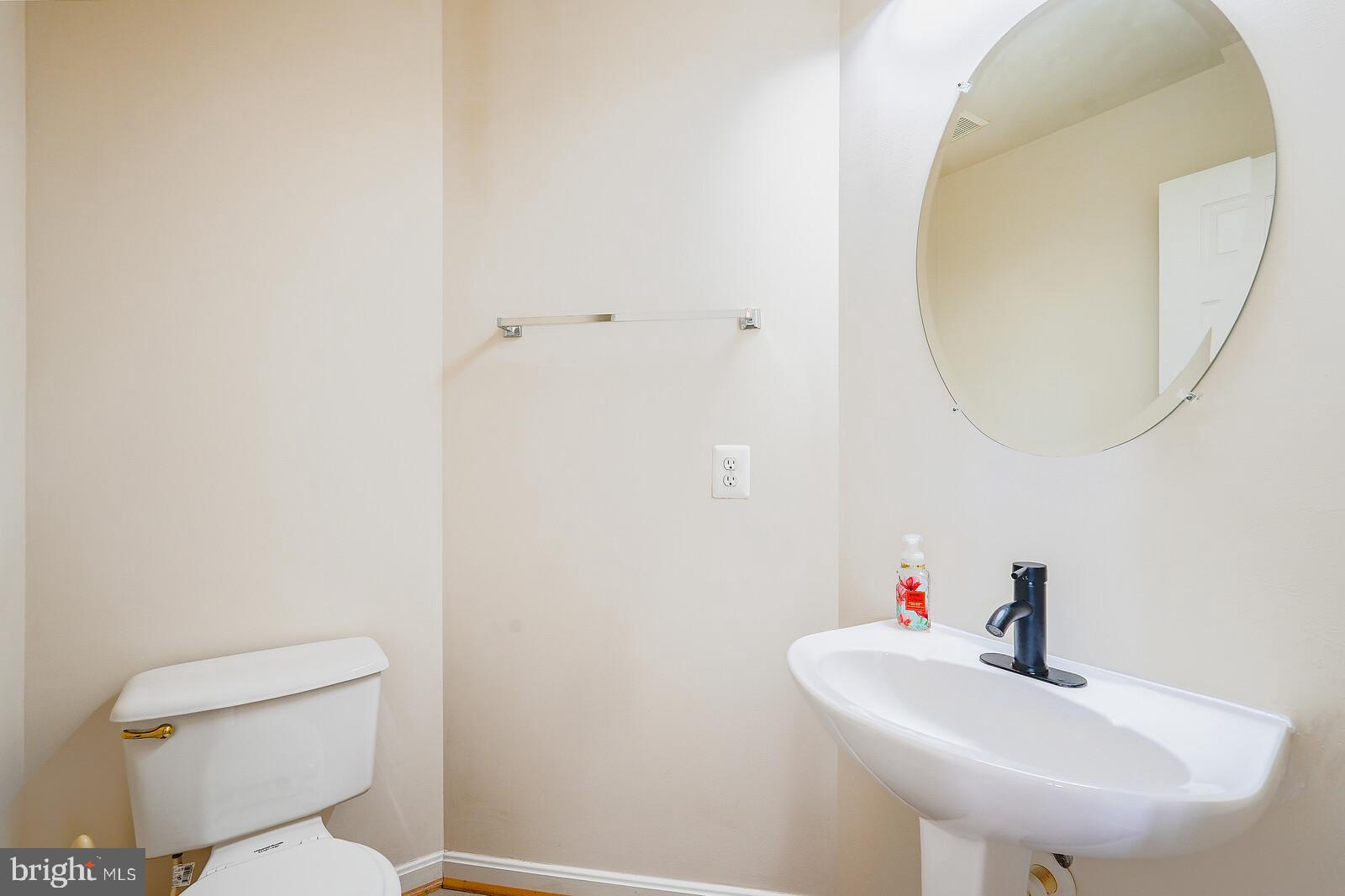 1318 Wheaton Lane Silver Spring, MD 20902 - Photo 7 of 46 Half bathroom (main level)
