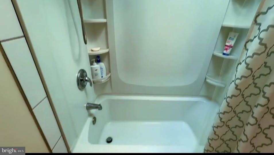 225 Poclain Road Aberdeen, MD 21001 - Photo 10 of 10 a bathroom with a bathtub