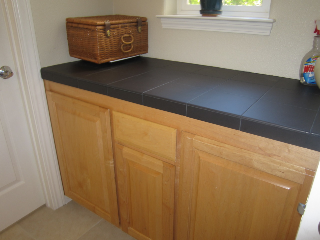 16300 Texas Springs Road Redding, CA 96001 - Photo 19 of 23 laundry's tile topped folding area
