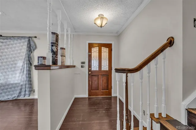 a view of entryway with stairs