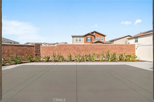 a view of a street with a building in the background