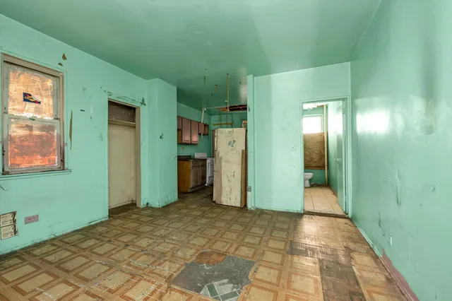 a view of a room with a bathroom