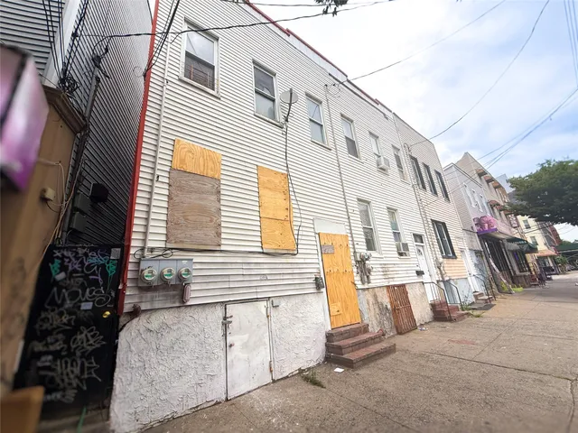 a view of a house with a street