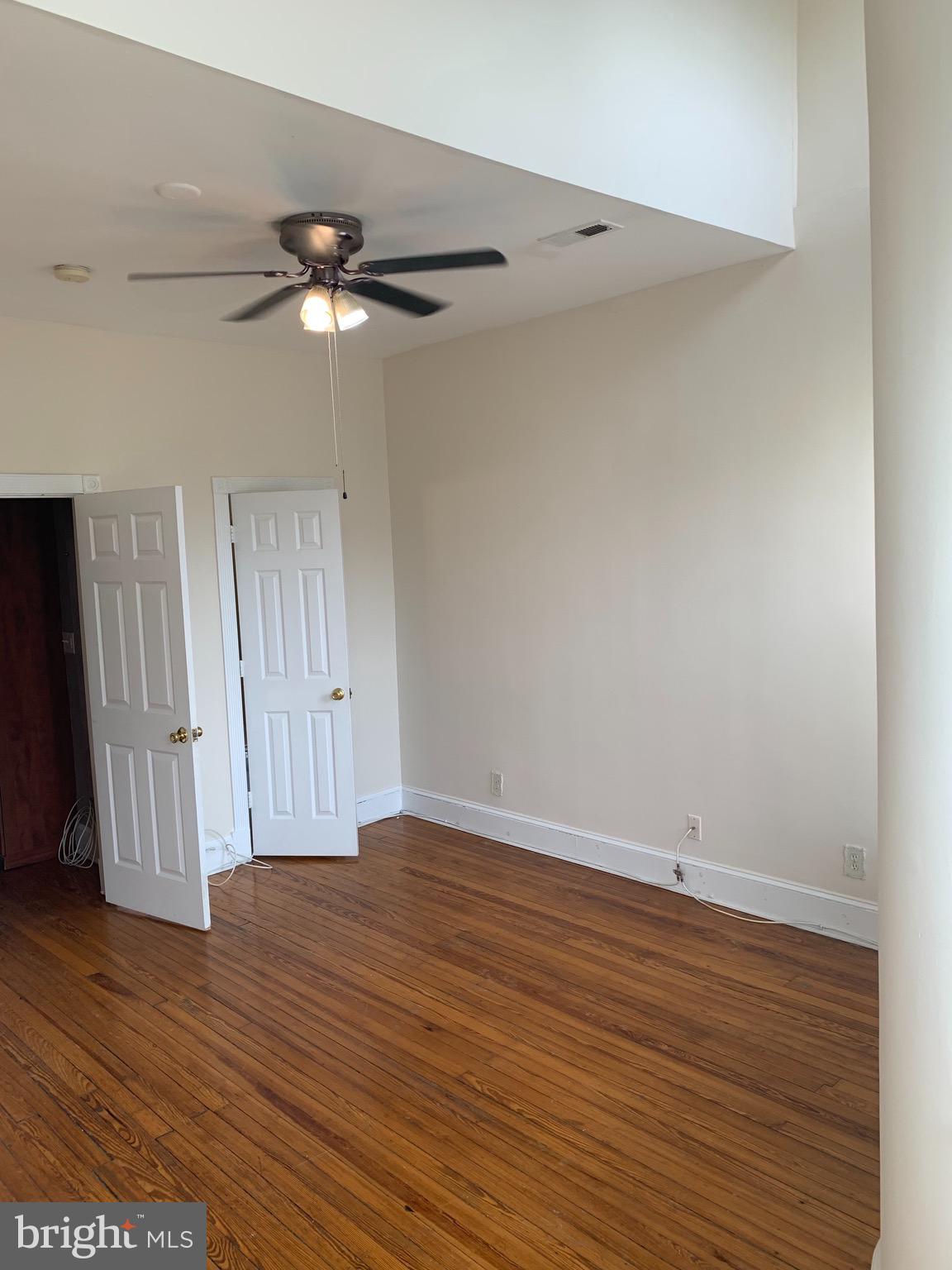 15 Seaton Place Northwest, Unit 1 Washington, DC 20001 - Photo 25 of 34 wooden floor in an empty room