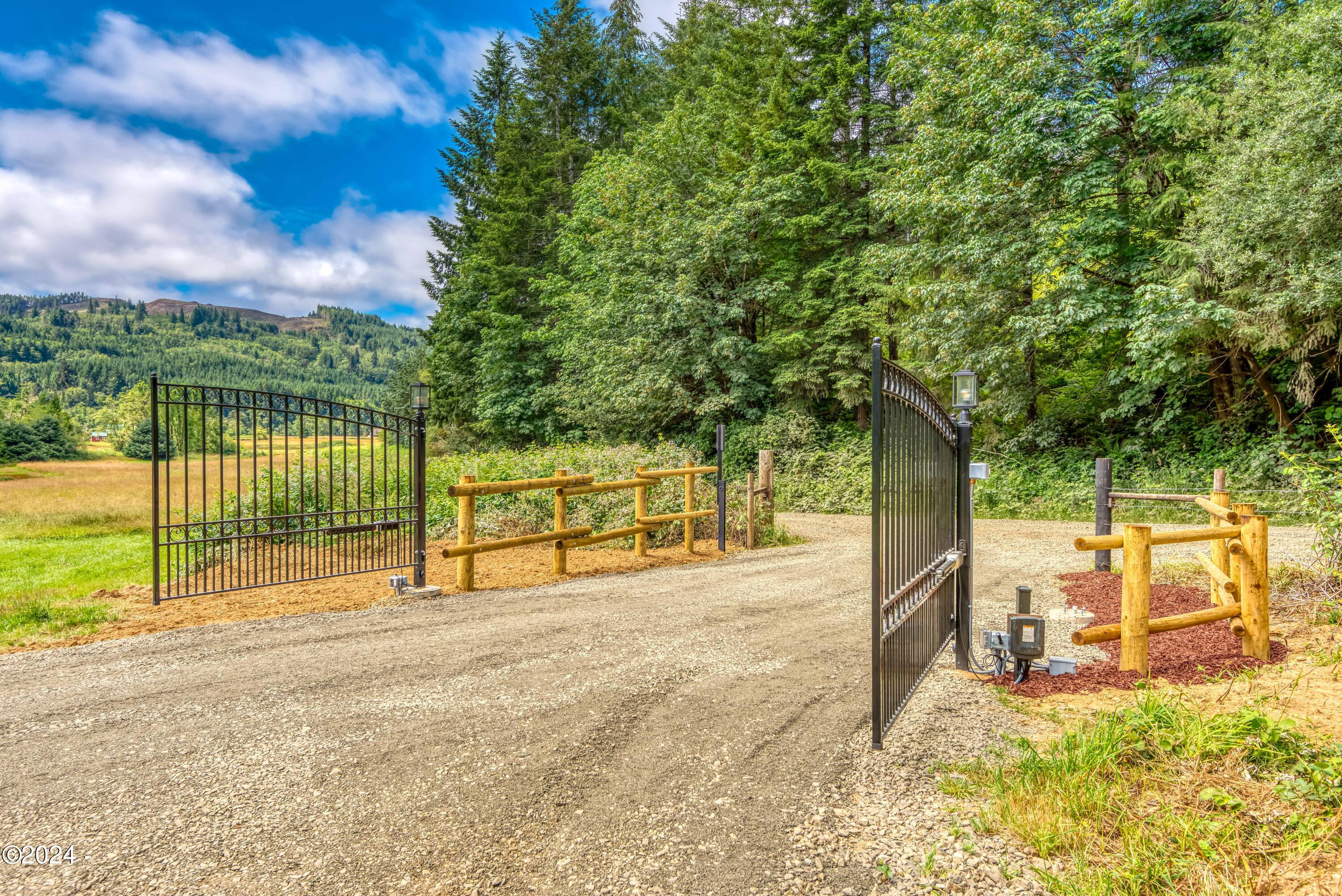 540 Big Rock Creek Road Blodgett, OR 97326 - Photo 2 of 54 Electric Gate entering home & property