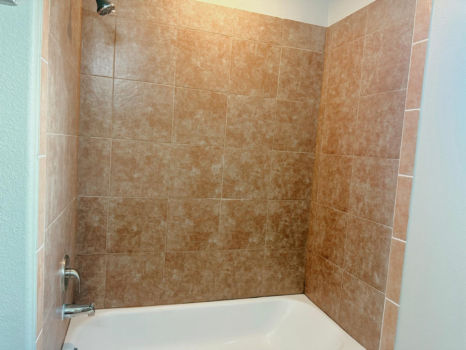 4480 Detroit Street Beaumont, TX 77703 - Photo 16 of 24 a bathroom with a shower