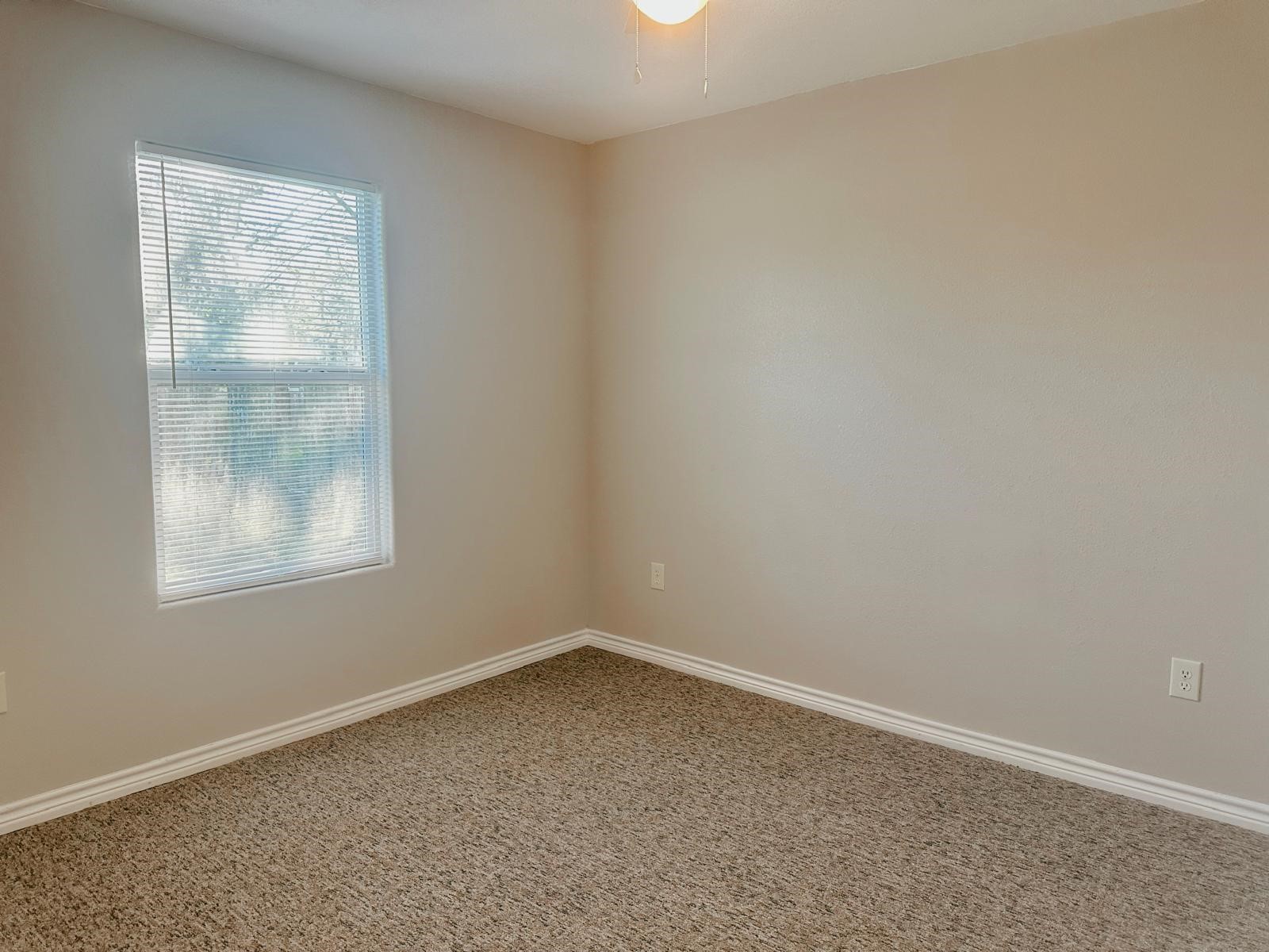4480 Detroit Street Beaumont, TX 77703 - Photo 18 of 24 an empty room with a window