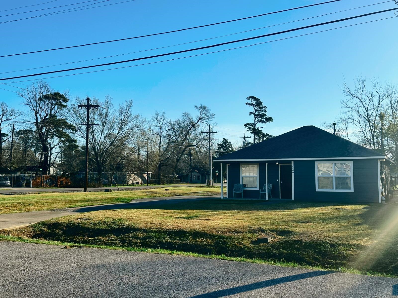 4480 Detroit Street Beaumont, TX 77703 - Photo 3 of 24 a front view of a house with a garden