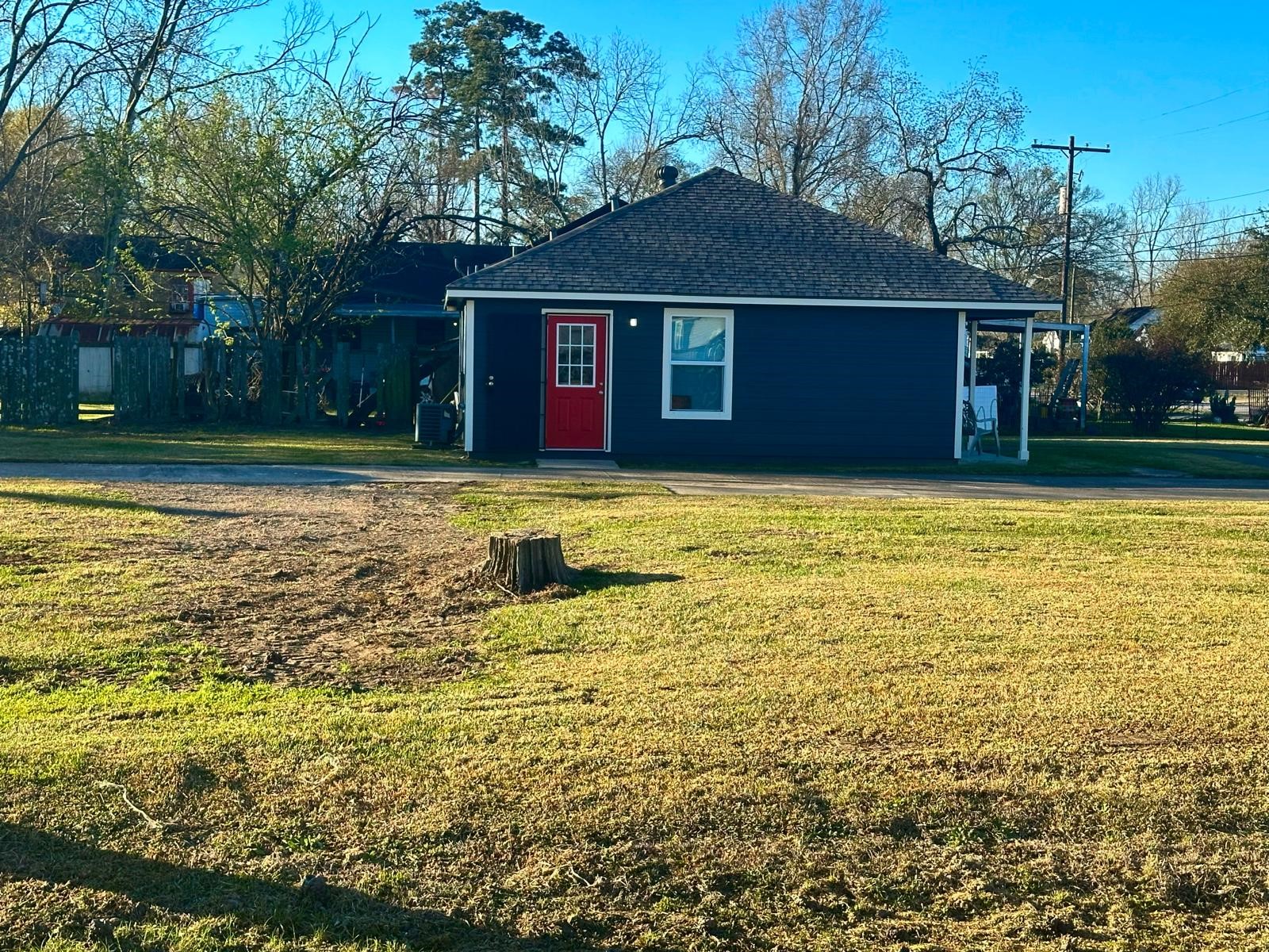 4480 Detroit Street Beaumont, TX 77703 - Photo 5 of 24 a front view of a house with a yard