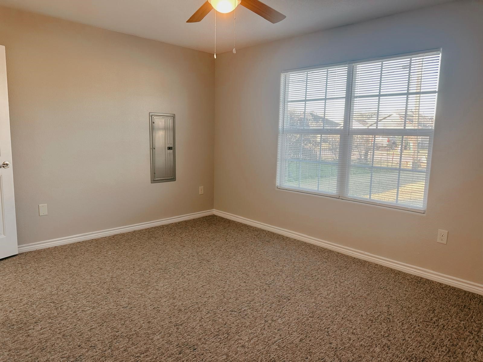 4480 Detroit Street Beaumont, TX 77703 - Photo 10 of 24 an empty room with a window