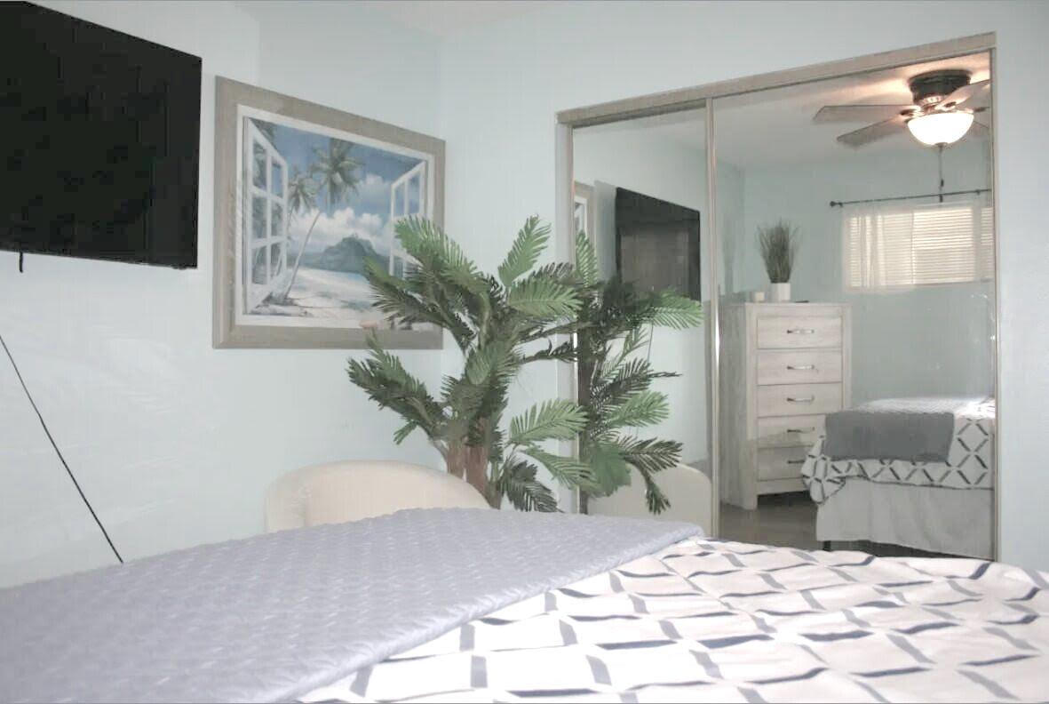 4000 Gulf Terrace Drive, Unit 2008 Destin, FL 32541 - Photo 11 of 35 a bedroom with a bed and a painting on the wall