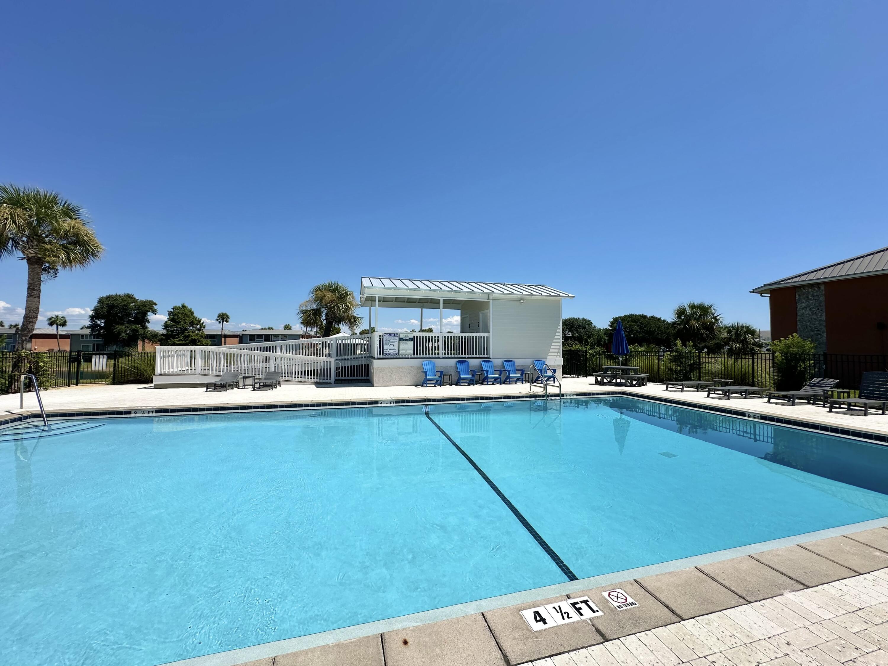 4000 Gulf Terrace Drive, Unit 2008 Destin, FL 32541 - Photo 21 of 35 a view of a kitchen with kitchen island and a potted plant
