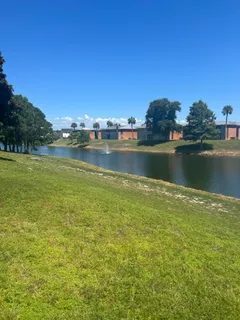 a view of an outdoor space and tennis court