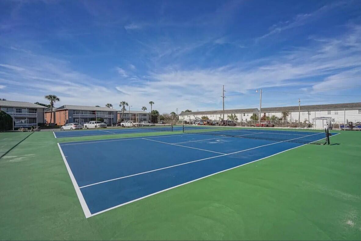 4000 Gulf Terrace Drive, Unit 2008 Destin, FL 32541 - Photo 34 of 35 a view of an outdoor space and tennis court