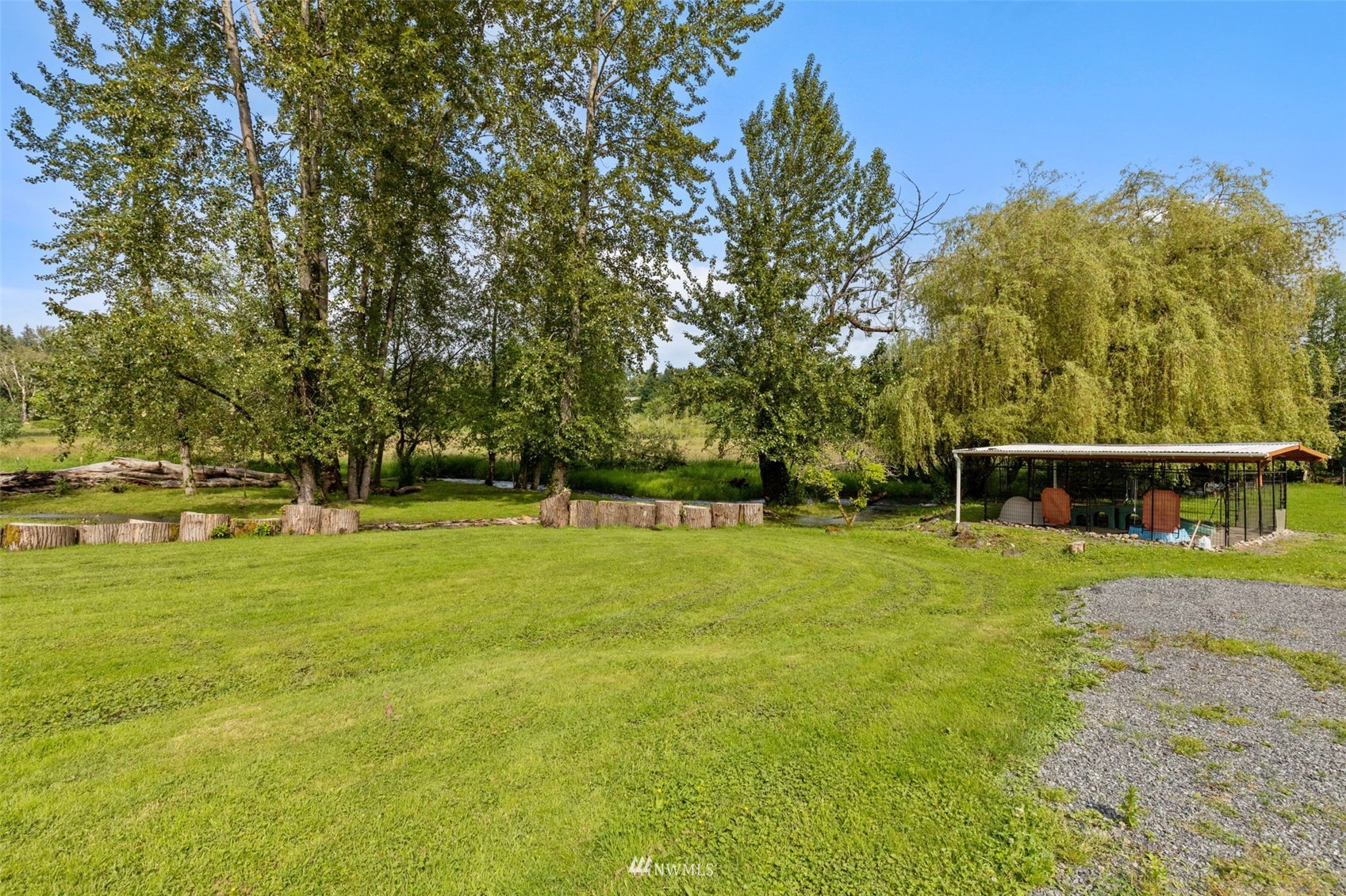 16231 Roosevelt Road Snohomish, WA 98290 - Photo 28 of 36 a view of a yard