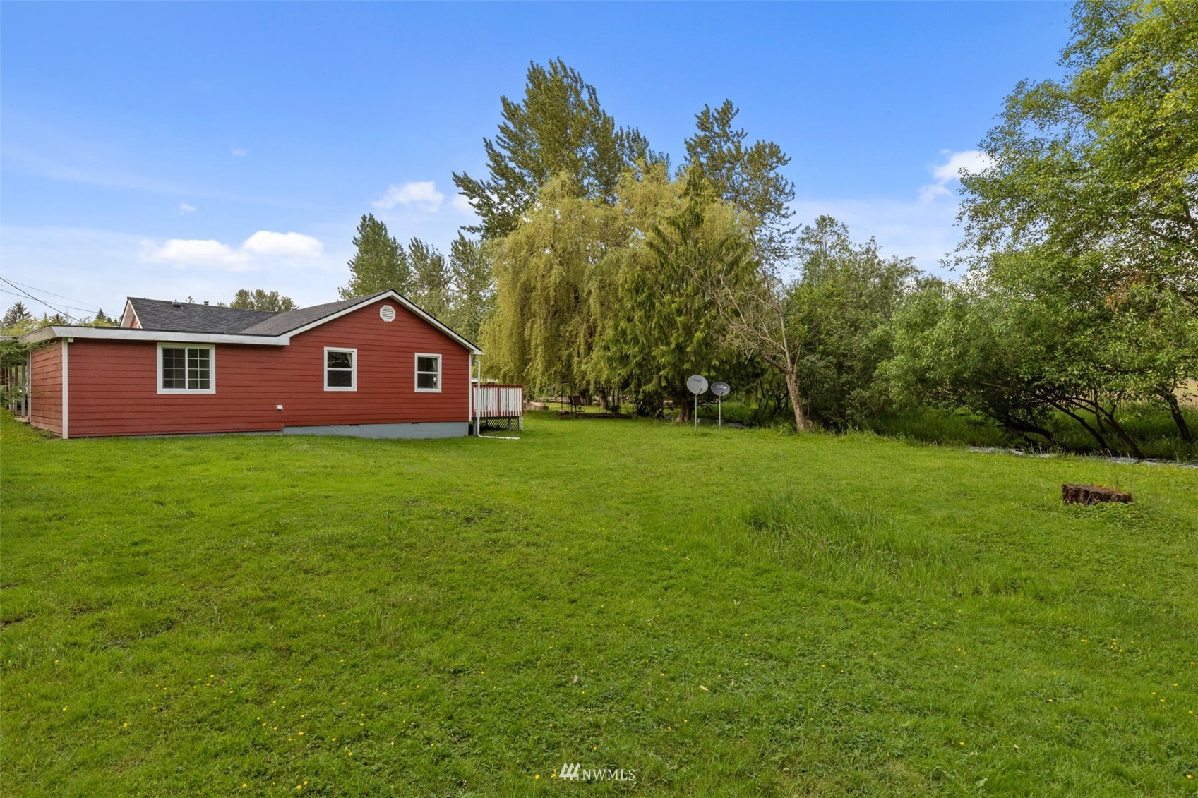 16231 Roosevelt Road Snohomish, WA 98290 - Photo 29 of 36 a house view with a garden space
