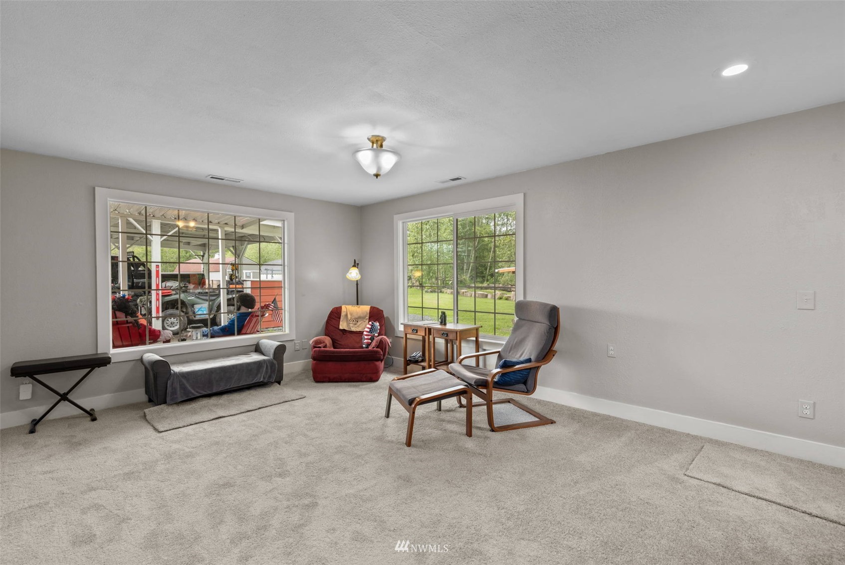 16231 Roosevelt Road Snohomish, WA 98290 - Photo 6 of 36 a living room with furniture and a large window