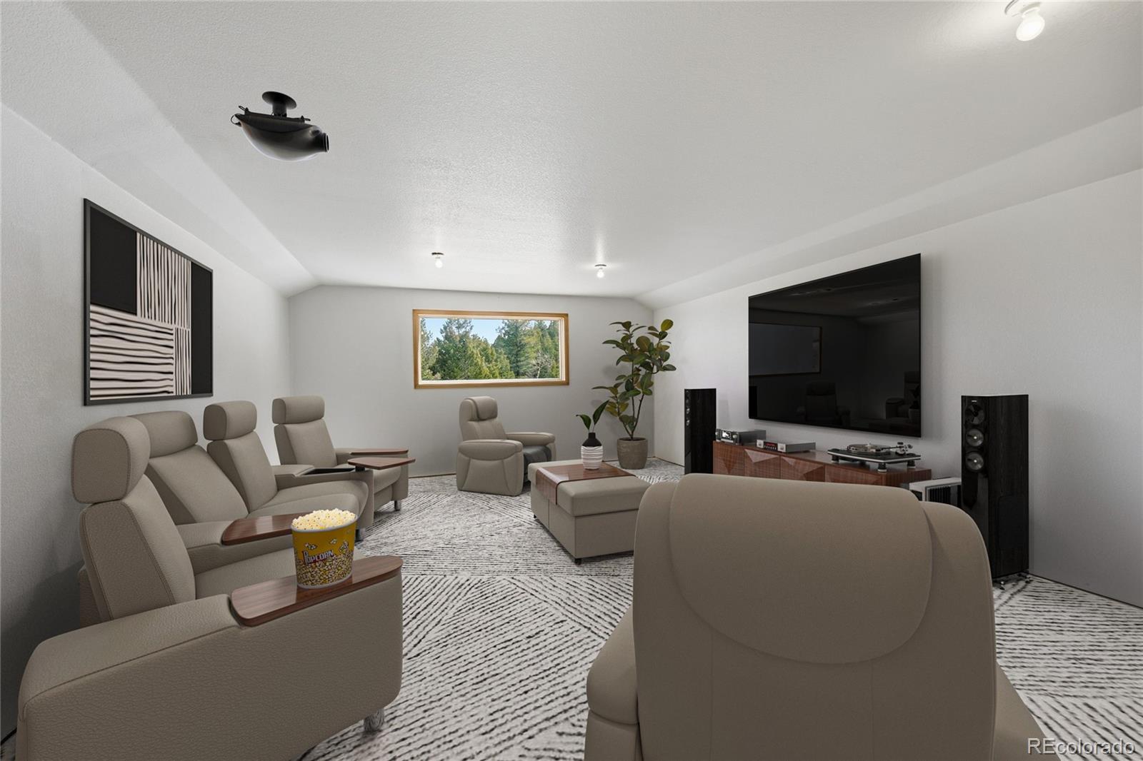 31842 Steven Way Conifer, CO 80433 - Photo 14 of 19 a living room with furniture and a flat screen tv
